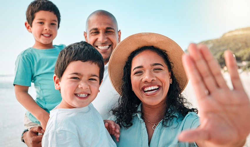 family of 4 at the beach