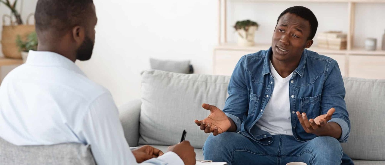 therapist and client sitting together